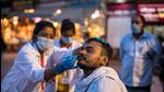 A health worker collects a nasal swab sample from a devotee to test for Covid-19 during Mahakumbh in Haridwar on April 12. (File photo)