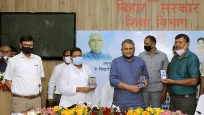 Bihar Education Minister Vijay Choudhary launches mobile app at his chamber in Patna on Friday. (Santosh Kumar /HT) Bihar Education Minister Vijay Choudhary launches mobile app at his chamber in Patna on Friday. (Santosh Kumar /HT)