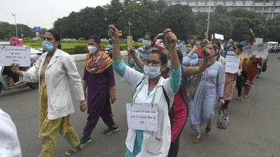 On Friday, over 300 employees of the National Health Mission marched from Government Multi-Specialty Hospital in Sector 16 to the Sector-17 Plaza, raising slogans against the Centre and the UT administration in Chandigarh. (HT FILE PHOTO)
