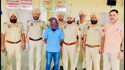 The taxi driver arrested with the heroin consignment in police custody. The taxi driver arrested with the heroin consignment in police custody.