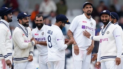 India's Mohammed Shami, third left, celebrates with teammates. (AP)