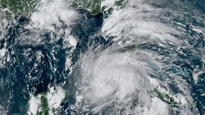 Widespread power outages and flooding from surging ocean surf were also predicted. (AP) Widespread power outages and flooding from surging ocean surf were also predicted. (AP)