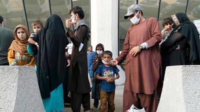 Children accompanied by their families evacuated from Kabul, Afghanistan. (AP)