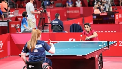 Bhavinaben Patel (red)