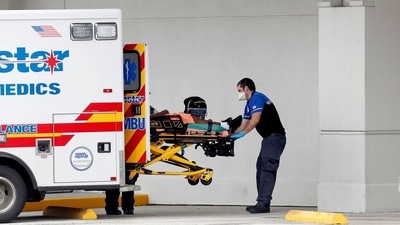 A paramedic admits a patient to the emergency ward at the Morton Plant Hospital in Clearwater, Florida, this month. (Octavio Jones / REUTERS) A paramedic admits a patient to the emergency ward at the Morton Plant Hospital in Clearwater, Florida, this month. (Octavio Jones / REUTERS)