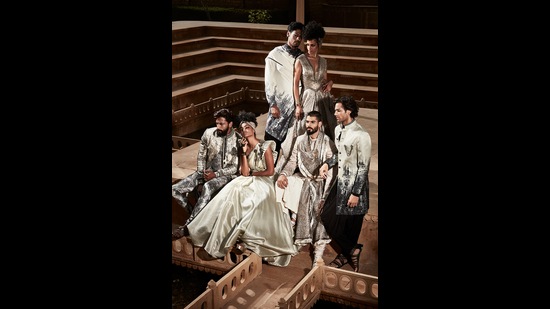 Models in the new cityscape-inspired motifs jackets and embellished gown Models in the new cityscape-inspired motifs jackets and embellished gown