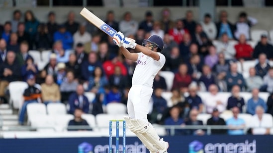 India's Rohit Sharma hits a six on a delivery by England's Ollie Robinson during the third day of third test cricket match between England and India, at Headingley cricket ground in Leeds, England, Friday, Aug. 27, 2021.