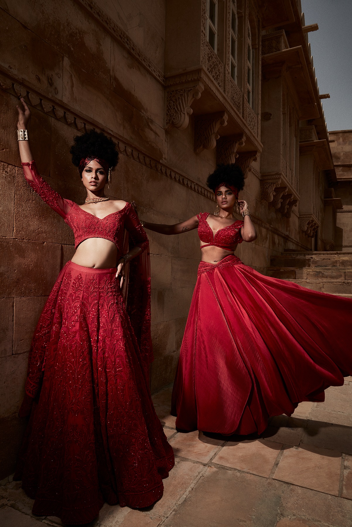 Models in ball gown inspired lehengas, peppered with crystal embroidery Models in ball gown inspired lehengas, peppered with crystal embroidery