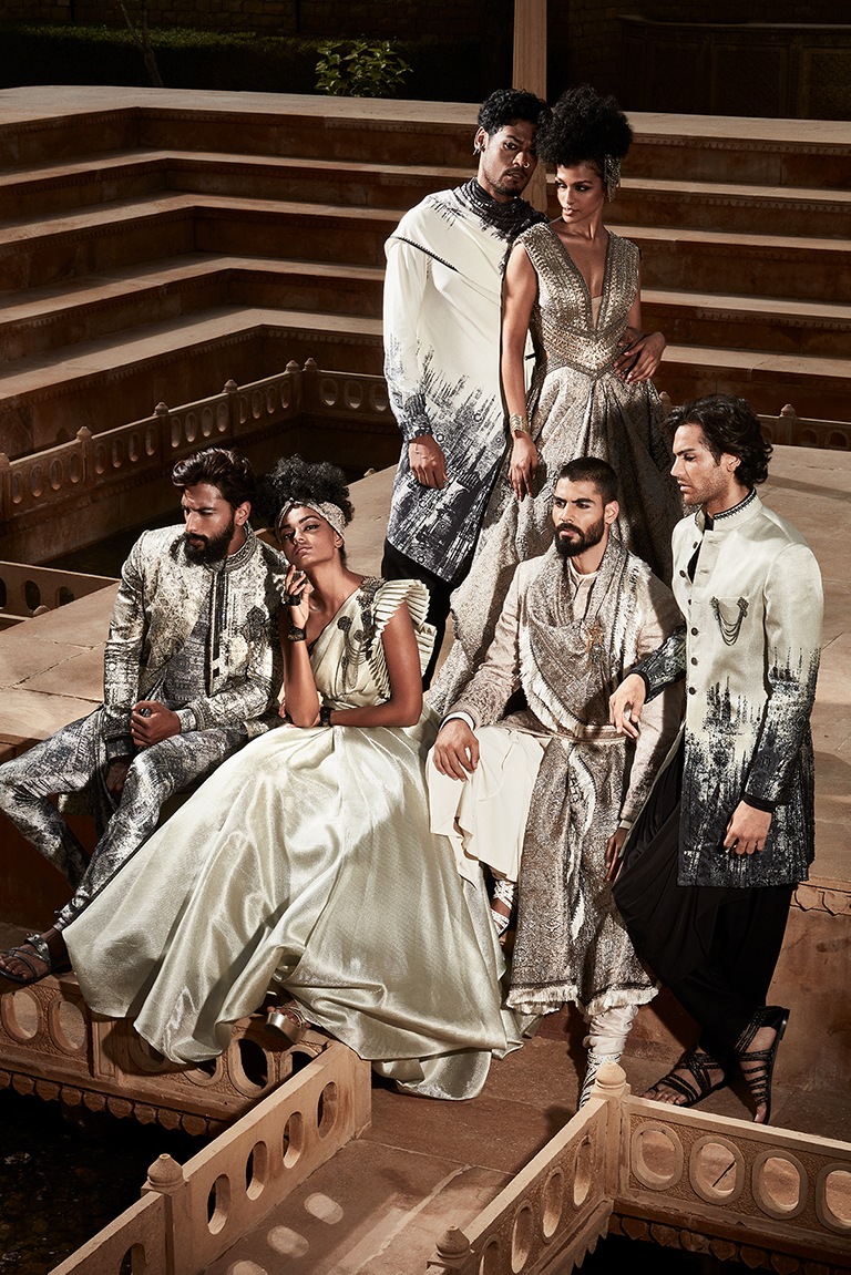 Models in the new cityscape-inspired motifs jackets and embellished gown Models in the new cityscape-inspired motifs jackets and embellished gown
