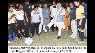 Haryana chief minister Manohar Lal Khattar kicking a ball at the Khelo Haryana event in Karnal on Saturday. (HT Photo)