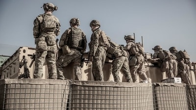 Approximately 6,800 people were evacuated from Kabul in a 24-hour period ending on Saturday. In picture - US troops at an evacuation control check point at the Hamid Karzai International Airport in Kabul, Afghanistan. (Reuters)