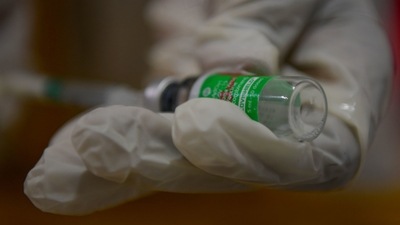 Authorities across Karnataka have administered 38,909,290 vaccine doses to people till now. (AFP file photo. Representative image) Authorities across Karnataka have administered 38,909,290 vaccine doses to people till now. (AFP file photo. Representative image)