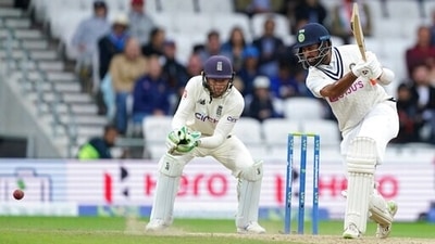 India's Cheteshwar Pujara, right, plays a shot during the third day of third Test. (AP)