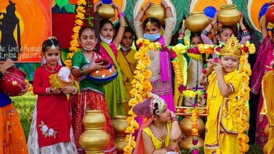 Children dress up as Lord Krishna and takes part in a fancy dress competition ahead of the 'Janmashtami festival', in Patiala. (PTI)