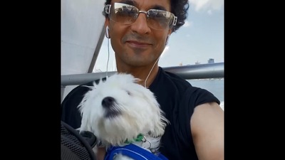 The image shows chef Vikas Khanna with his pet dog. (Instagram/@vikaskhannagroup)