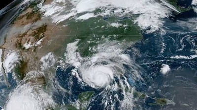 The National Weather Service warned that the storm surge can cause major damage to houses and pose a “significant threat for drownings.” (Twitter / @NOAASatellites)