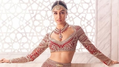 Shradhha Kapoor is a modern bride in Falguni Shane Peacock's dreamy couture red lehenga (Instagram/@falgunishanepeacockindia) Shradhha Kapoor is a modern bride in Falguni Shane Peacock's dreamy couture red lehenga (Instagram/@falgunishanepeacockindia)