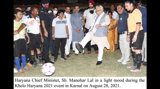 Haryana chief minister Manohar Lal Khattar kicking a ball at the Khelo Haryana event in Karnal on Saturday. (HT Photo)