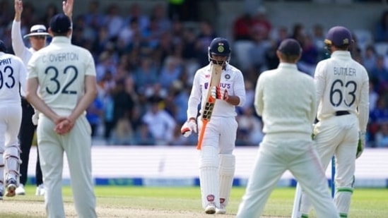 India's Ravindra Jadeja, center, looks at his bat after hitting a six during the fourth day of third test cricket match between England and India, at Headingley cricket ground in Leeds, England, Saturday, Aug. 28, 2021. (AP Photo/Jon Super)(AP)