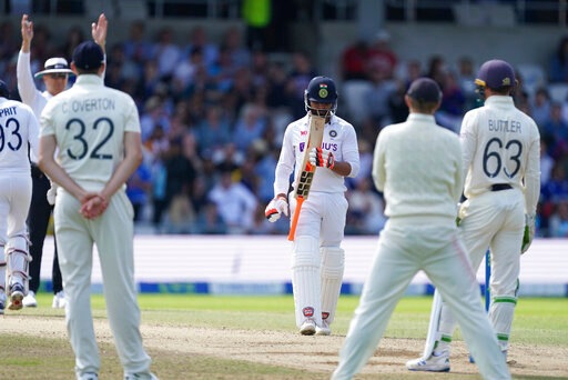 India's Ravindra Jadeja, center, looks at his bat after hitting a six during the fourth day of third test cricket match between England and India, at Headingley cricket ground in Leeds, England, Saturday, Aug. 28, 2021. (AP Photo/Jon Super) India's Ravindra Jadeja, center, looks at his bat after hitting a six during the fourth day of third test cricket match between England and India, at Headingley cricket ground in Leeds, England, Saturday, Aug. 28, 2021. (AP Photo/Jon Super)