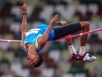 Nishad Kumar of India competes in the men's high jump - T47 final at Tokyo 2020 Paralympic Games in Tokyo.