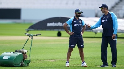Indian cricket coach Ravi Shastri, right, with Ajinkya Rahane during a nets session at Headingley cricket ground in Leeds. (AP)