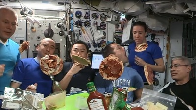 The image is taken from the 'floating pizza night' video. (Instagram/@thom_astro)