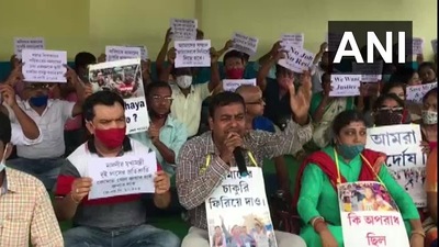 Teachers whose jobs were terminated stage demonstration in Tripura's Agartala