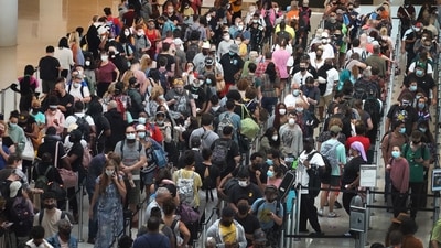 People stand in line to get through the TSA security checkpoint at Louis Armstrong New Orleans International Airport on August 28 in New Orleans, Louisiana. (AFP) People stand in line to get through the TSA security checkpoint at Louis Armstrong New Orleans International Airport on August 28 in New Orleans, Louisiana. (AFP)