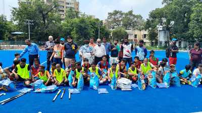 Young hockey players pose after winning Major Dhyan Chand Tournament in Kanpur. (Sourced) Young hockey players pose after winning Major Dhyan Chand Tournament in Kanpur. (Sourced)