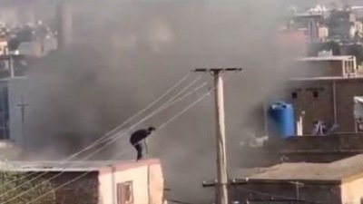 Photos and videos of a huge smoke in a congested residential area near Kabul airport surfaced on social media soon after the blasts were reported on Sunday. (Photo: Twitter)