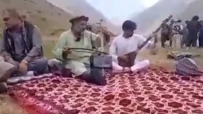 After the news of the killing of Fawad Andarabi surfaced, videos of the singer (middle) were shared on social media. (Photo: Twitter)