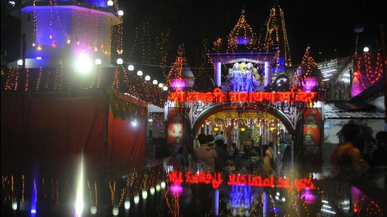 The Sector-20 temple decked up on the eve of Janmashtami in Chandigarh on Sunday. (Keshav Singh/HT)
