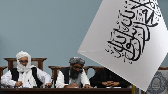 Taliban’s acting Higher Education Minister Abdul Baqi Haqqani (L) attends a consultative meeting on Taliban's general higher education policies at the Loya Jirga Hall in Kabul. (AFP)