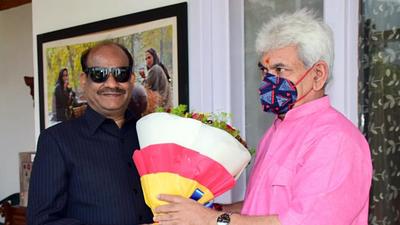 Lok Sabha Speaker Om Birla calls on J&K L-G Manoj Sinha ahead of the Parliamentary outreach programme, in Srinagar on Sunday. (ANI)