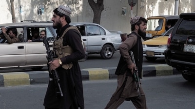 Taliban fighters guard a check-point on a main street in Kabul on August 29, 2021. (Reuters Photo)
