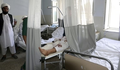 Afghans receive medical care after being injured in fighting between the Taliban and Afghan security forces, at a hospital in Mazar-e-Sharif, Afghanistan (AP Photo) Afghans receive medical care after being injured in fighting between the Taliban and Afghan security forces, at a hospital in Mazar-e-Sharif, Afghanistan (AP Photo)