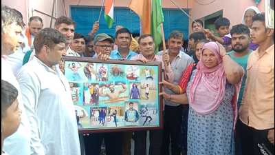 Family members and friends of Sumit Antil at his house in Khewra village of Sonepat district on Monday. (HT PHoto) Family members and friends of Sumit Antil at his house in Khewra village of Sonepat district on Monday. (HT PHoto)