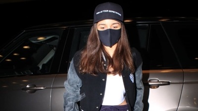 Alia was seen at the Mumbai airport on Friday. Alia was seen at the Mumbai airport on Friday.