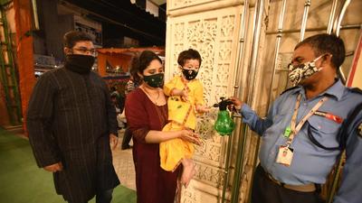 Visitors to the Shri Shiv Narayan Sidheshwar temple, located on Gurudwara Road, are asked to sanitise their hands before entering the premises to curtail the spread of coronavirus cases. (Parveen Kumar/HT Photo) Visitors to the Shri Shiv Narayan Sidheshwar temple, located on Gurudwara Road, are asked to sanitise their hands before entering the premises to curtail the spread of coronavirus cases. (Parveen Kumar/HT Photo)
