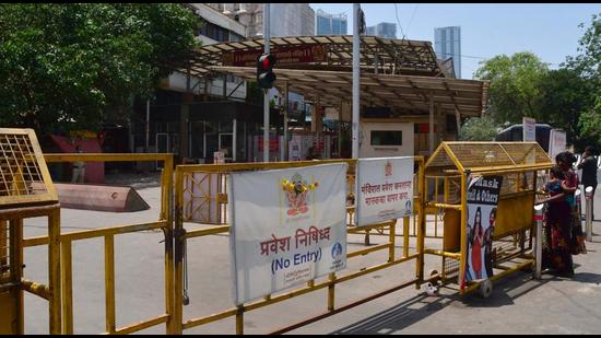 Devotees pray outside the Siddhivinayak Ganapati temple in Mumbai on April 6, 2021. (File photo)