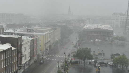 Rain batters N Peters Street in New Orleans, Louisiana, with St. Louis Cathedral visible in the distance on August 29. The storm, wielding some of the most powerful winds ever to hit the state, drove a wall of water inland when it thundered ashore on August 29 as a Category 4 hurricane and reversed the course of part of the Mississippi River, Bloomberg reported.(Patrick T Fallon / AFP)