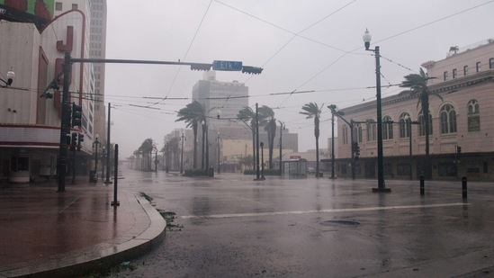 An empty intersection is shown in downtown on August 29, 2021 in New Orleans, Louisiana. (AFP)