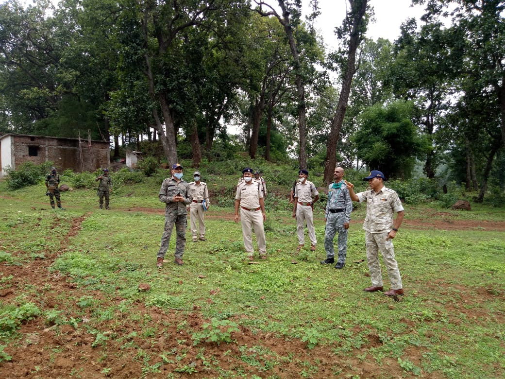 Officers survey Baiga Chak for Maoist camps. (Sourced) Officers survey Baiga Chak for Maoist camps. (Sourced)