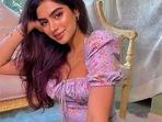 Khushi Kapoor poses in a purple dress. Khushi Kapoor poses in a purple dress.