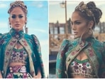Jennifer Lopez in Dolce & Gabbana jewelled bra top, floral cape and gold crown is a queen(Instagram/@jlo) Jennifer Lopez in Dolce & Gabbana jewelled bra top, floral cape and gold crown is a queen(Instagram/@jlo)