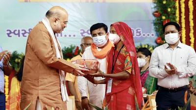 Union home minister Amit Shah at the launch of nutritious 'Laddu Distribution Scheme' for pregnant women, in Gandhinagar on Monday. (PTI)