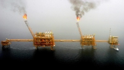 Gas flares from an oil production platform in the Persian Gulf. ( REUTERS) Gas flares from an oil production platform in the Persian Gulf. ( REUTERS)