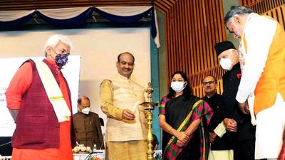 Lok Sabha speaker Om Birla lights the lamp in presence of National Conference chief Farooq Abdullah, J&K LG Manoj Sinha, and others during the inauguration of the Parliamentary Outreach Programme in Srinagar on Tuesday. (ANI) Lok Sabha speaker Om Birla lights the lamp in presence of National Conference chief Farooq Abdullah, J&K LG Manoj Sinha, and others during the inauguration of the Parliamentary Outreach Programme in Srinagar on Tuesday. (ANI)