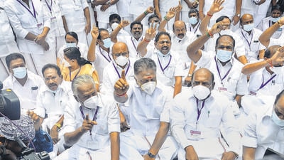 Deputy Leader of Opposition and AIADMK convener O. Panneerselvam with party MLAs stages a dharna to protest against the move of the DMK government to merge Dr. J. Jayalalithaa University with Annamalai University, during the Assembly session, at Kalaivanar Arangam in Chennai on Tuesday. (PTI) Deputy Leader of Opposition and AIADMK convener O. Panneerselvam with party MLAs stages a dharna to protest against the move of the DMK government to merge Dr. J. Jayalalithaa University with Annamalai University, during the Assembly session, at Kalaivanar Arangam in Chennai on Tuesday. (PTI)